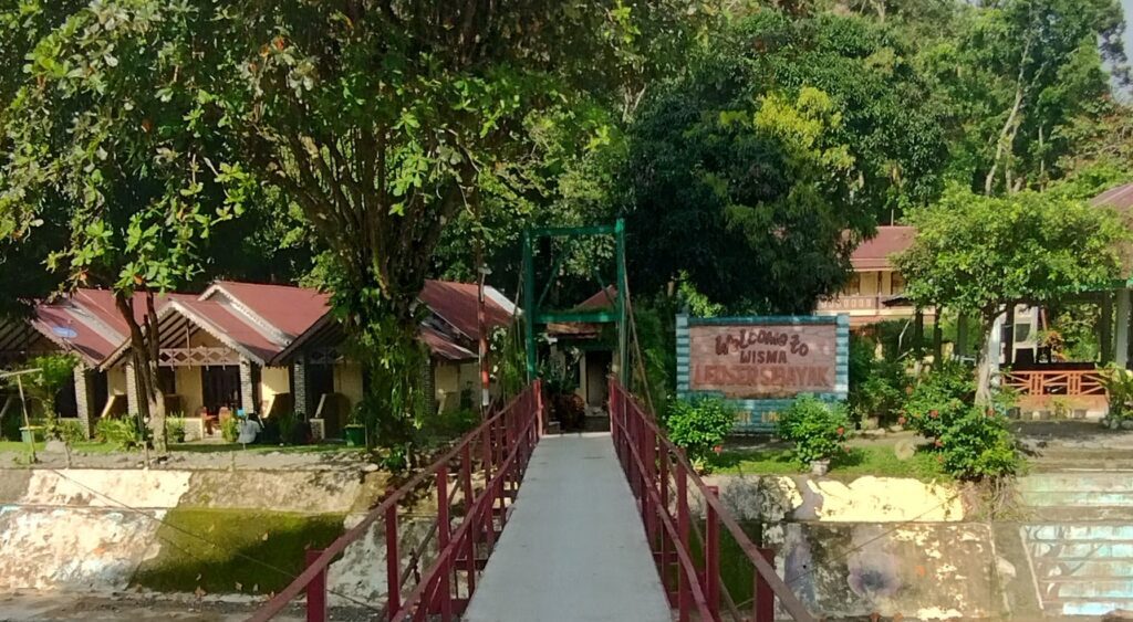 bridge and entrance to national park bukit lawang