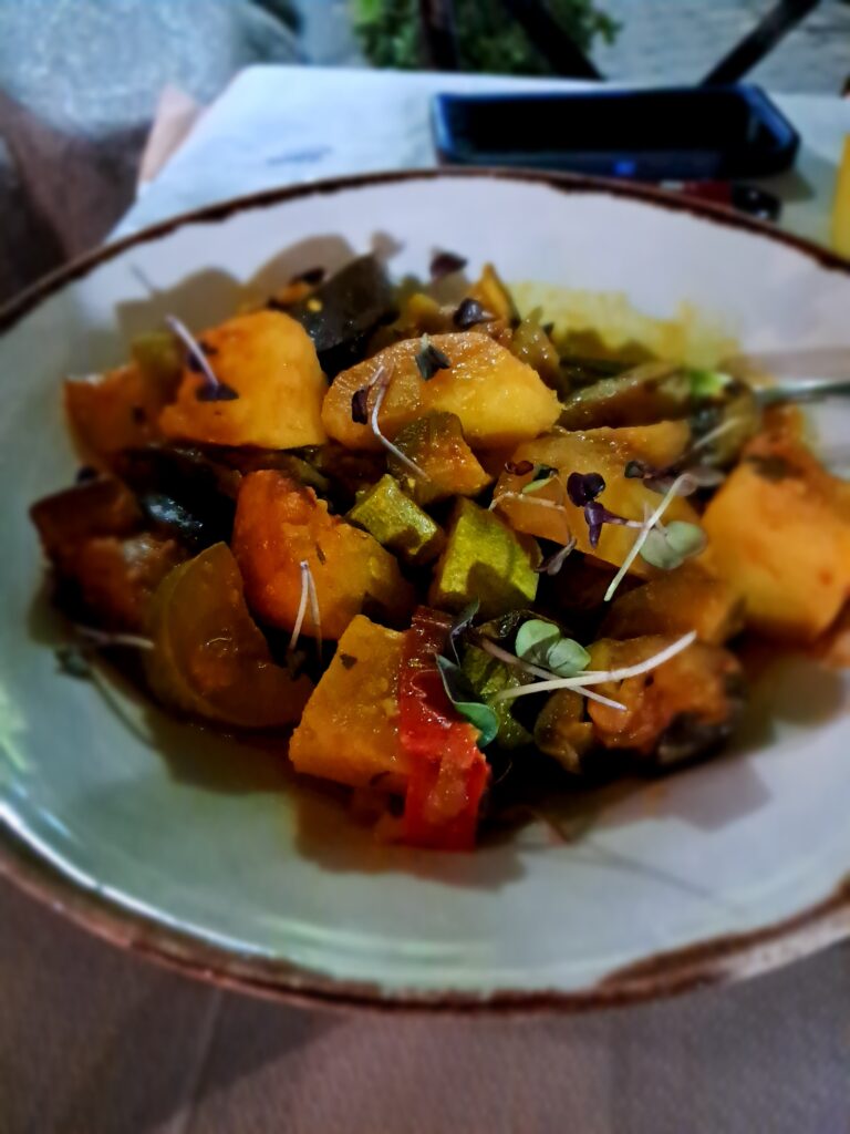 Roasted vegetable briam dish at a restaurant in Kalambaka near Meteora, a vegan food option in Greece