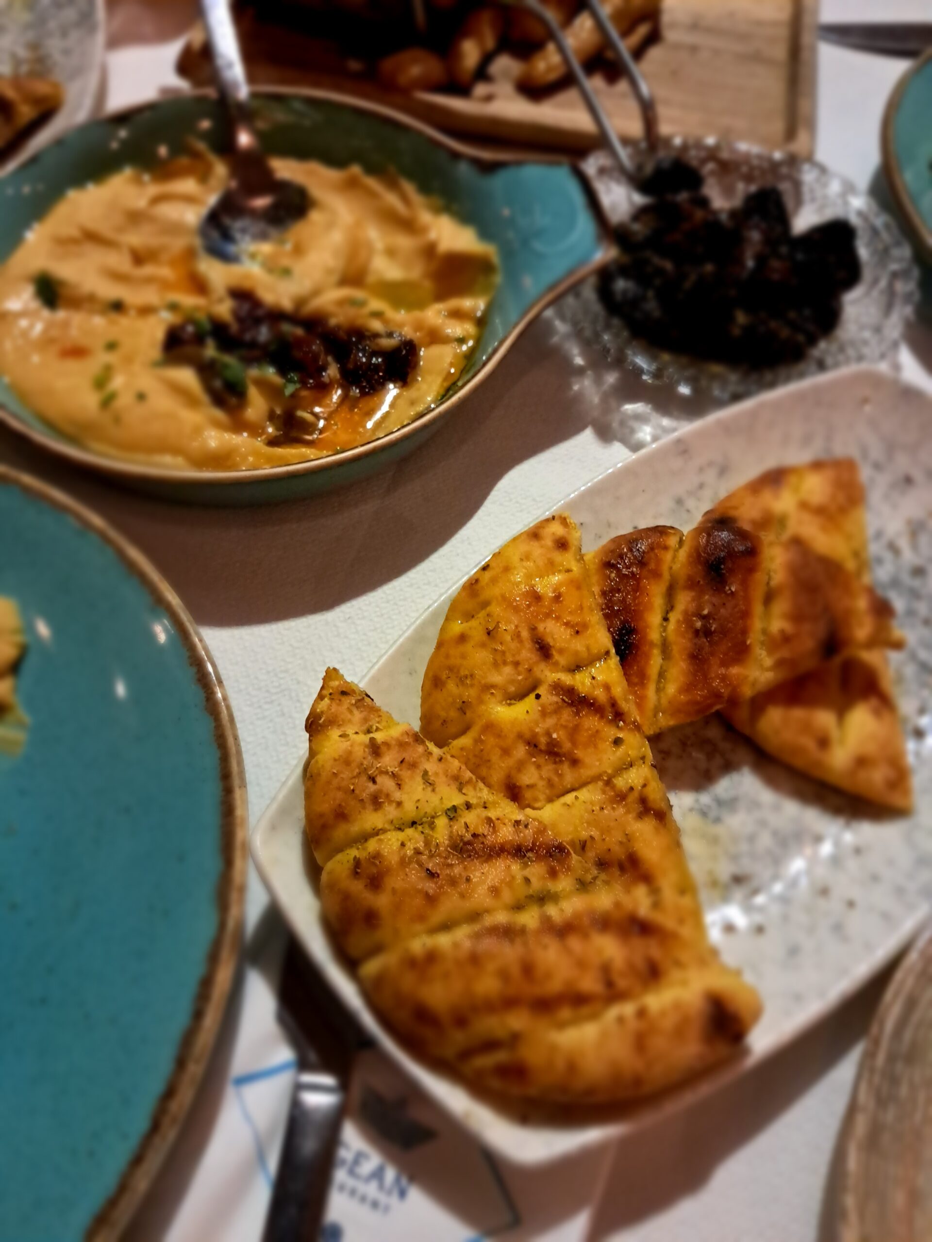 Vegan hummus and flatbread at a restaurant near Imerovigli Santorini