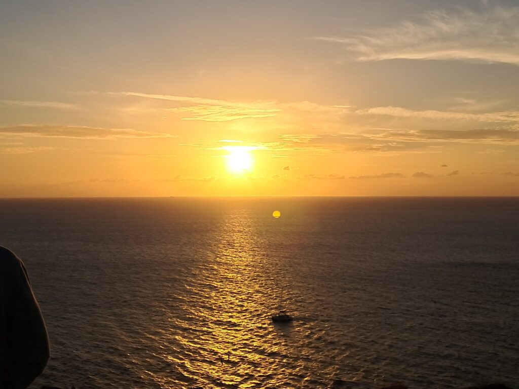 Sunset over the sea in Oia, Santorini, the view we almost missed waiting for a bus that never came