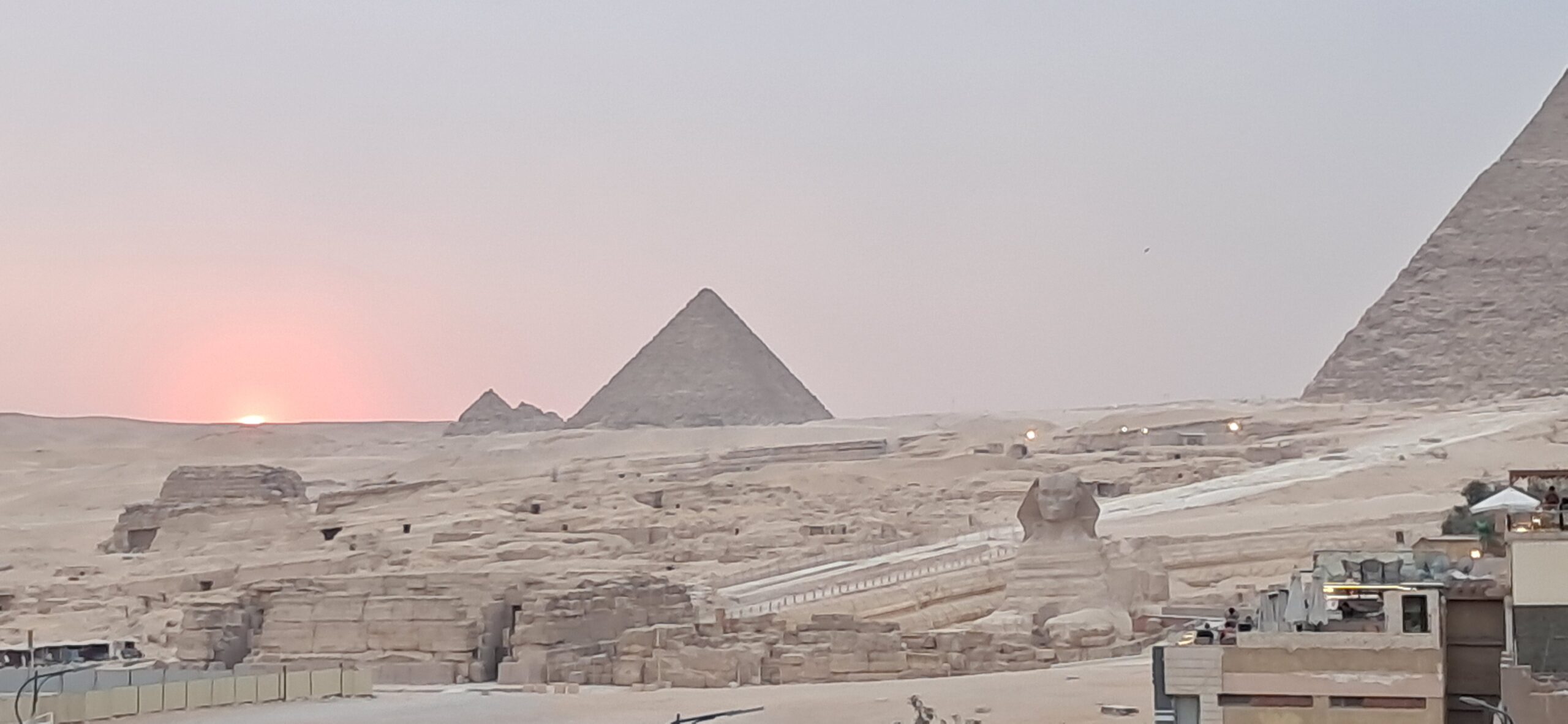 View of the Giza Pyramids from the rooftop terrace at Pyramids Cave Lounge restaurant, Cairo
