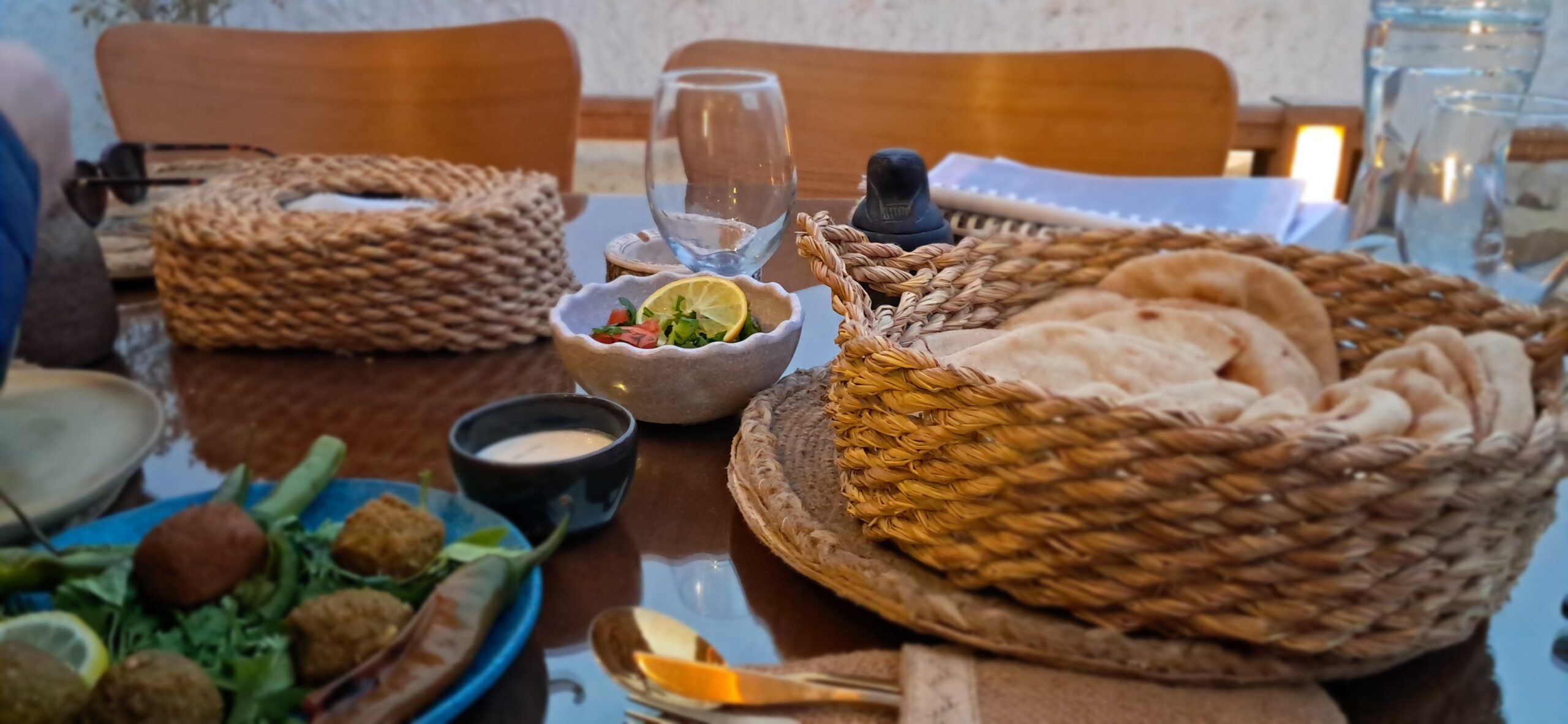 A spread of ta’ameya, Egyptian flatbread, salads and dips: the heart of what vegans can eat in Egypt