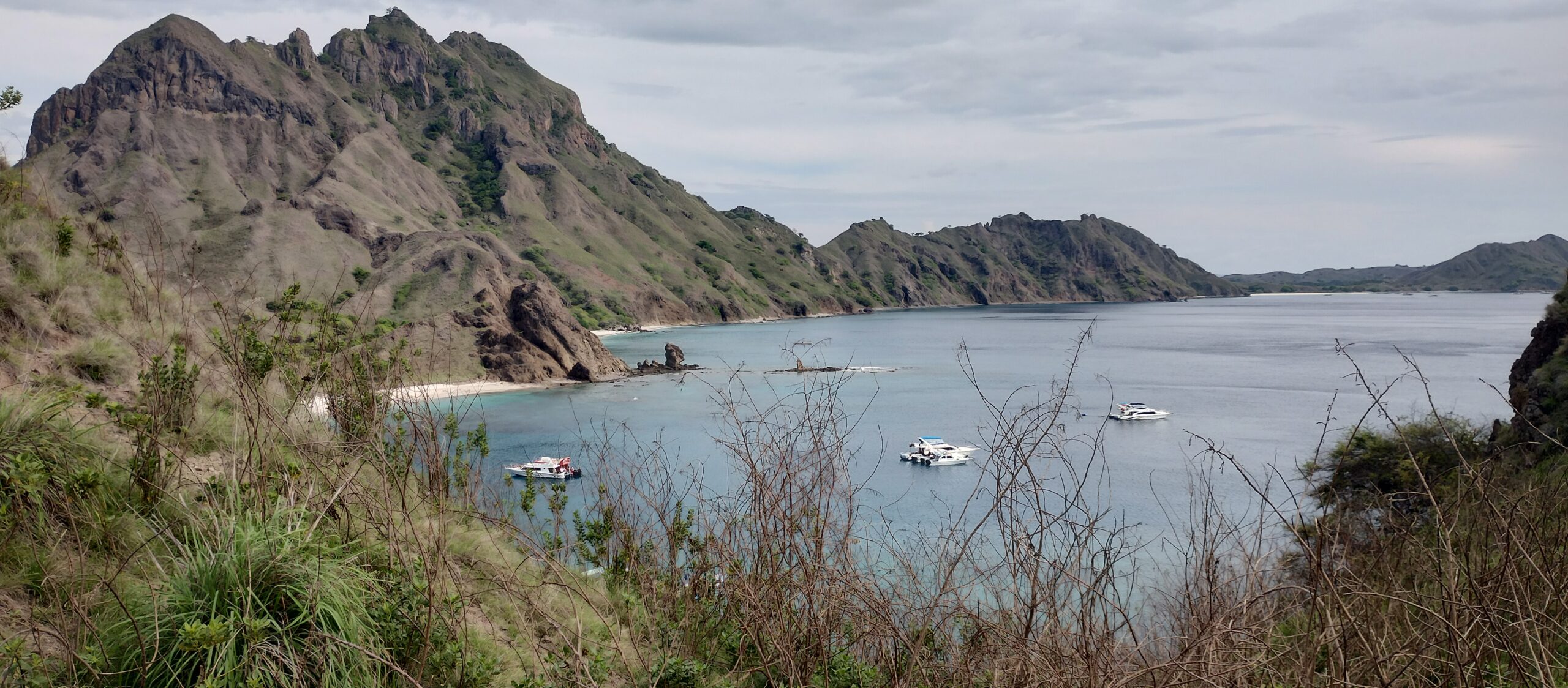 Boats anchored in the bay below the Padar Island viewpoint, Komodo National Park
