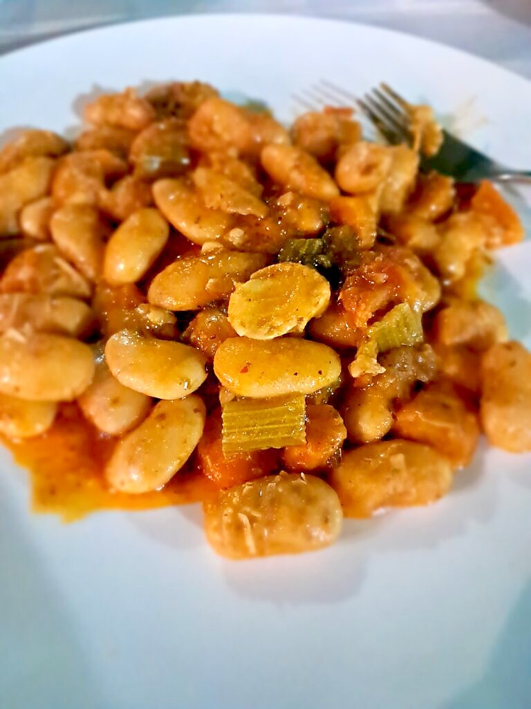 Gigantes plaki, giant white beans baked in tomato sauce, a naturally vegan traditional Greek dish at a Kalambaka restaurant near Meteora