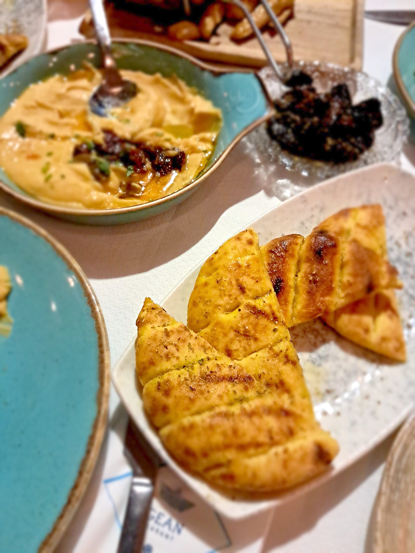 Vegan hummus and flatbread at a restaurant near Imerovigli Santorini