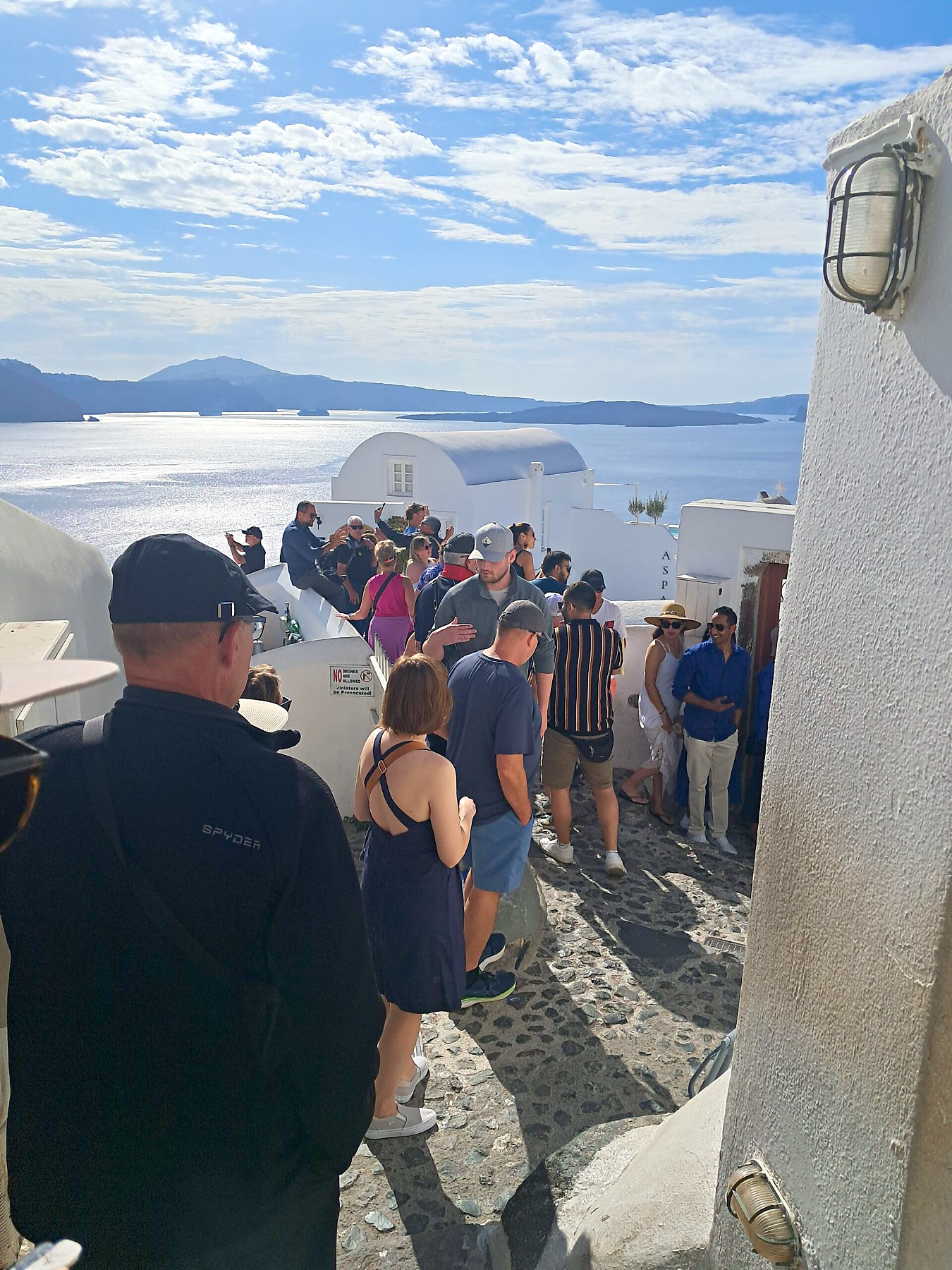 Crowds queuing at the Oia viewpoint in Santorini at the end of October