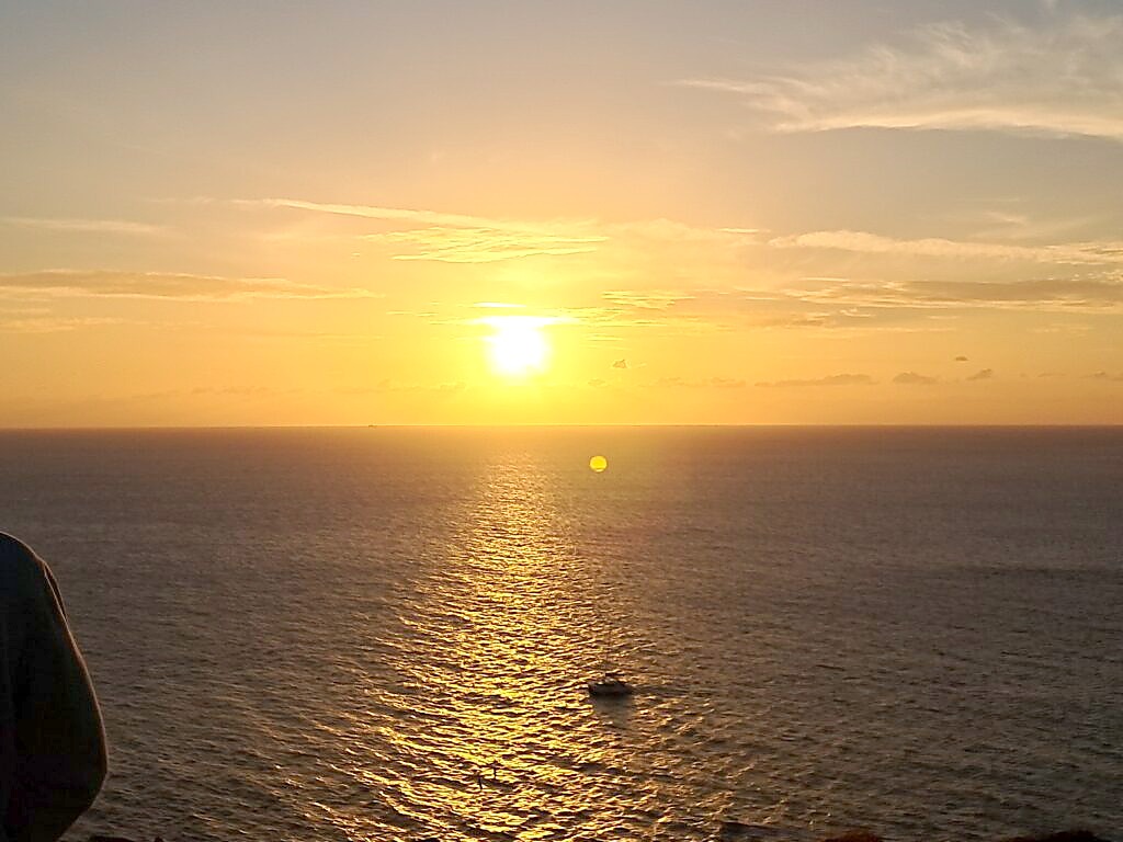 Sunset over the sea in Oia, Santorini, the view we almost missed waiting for a bus that never came
